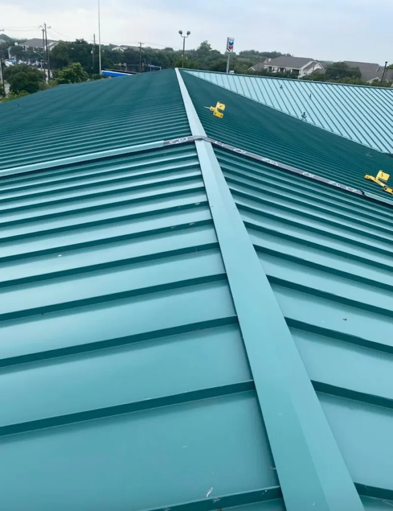 Green commercial metal roof ridge and valley for Metal Roof Repair in Cheverly